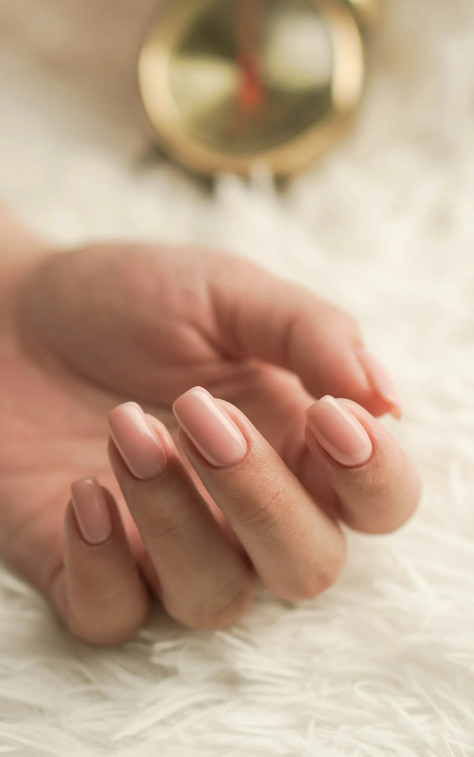 Illustrative neutral manicure; not work by Polished by Parneet